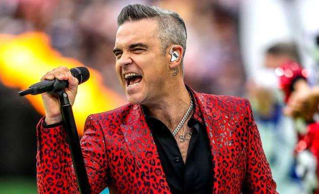 罗比-威廉姆斯回应竖中指:本意是世界杯剩1分