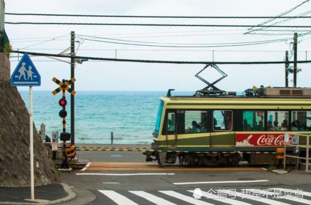 因为井上雄彦的经典动漫《灌篮高手,让这个普通的路口几乎成了旅游