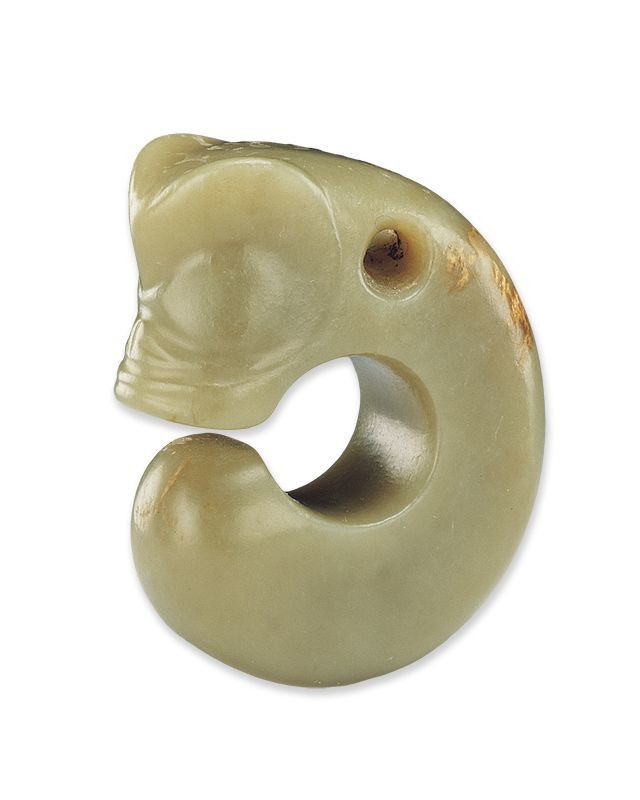 红山文化 玉猪龙良渚文化玉器中龙的形象较为少见,类似本拍品的官方