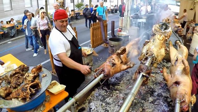 塞尔维亚人真爱吃烤肉,50斤的羊100斤的猪整