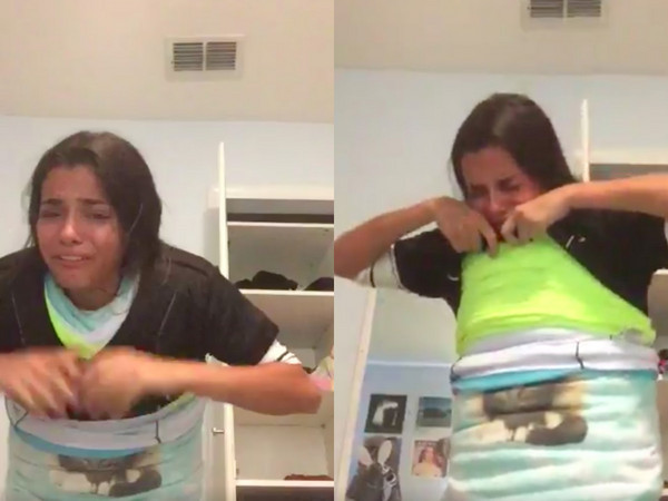 美国女子挑战穿百件衣服却无法脱掉 险些窒息(图)