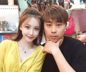 卢本伟会为了此事和钱小佳握手