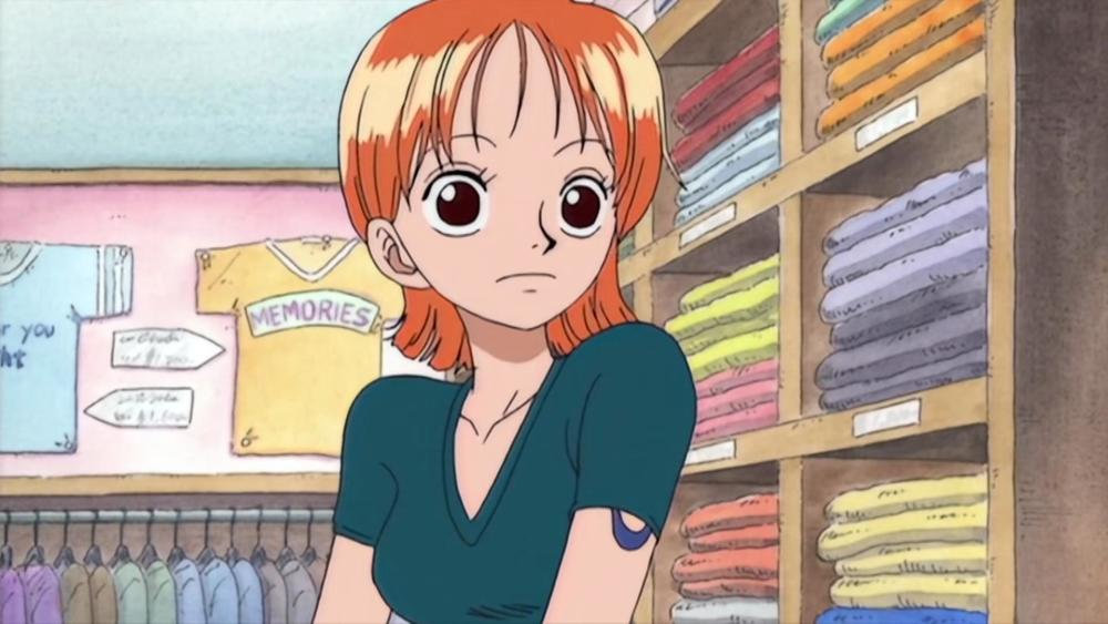 娜美 两年前:短发娜美俏皮可爱,穿着比较少女风.