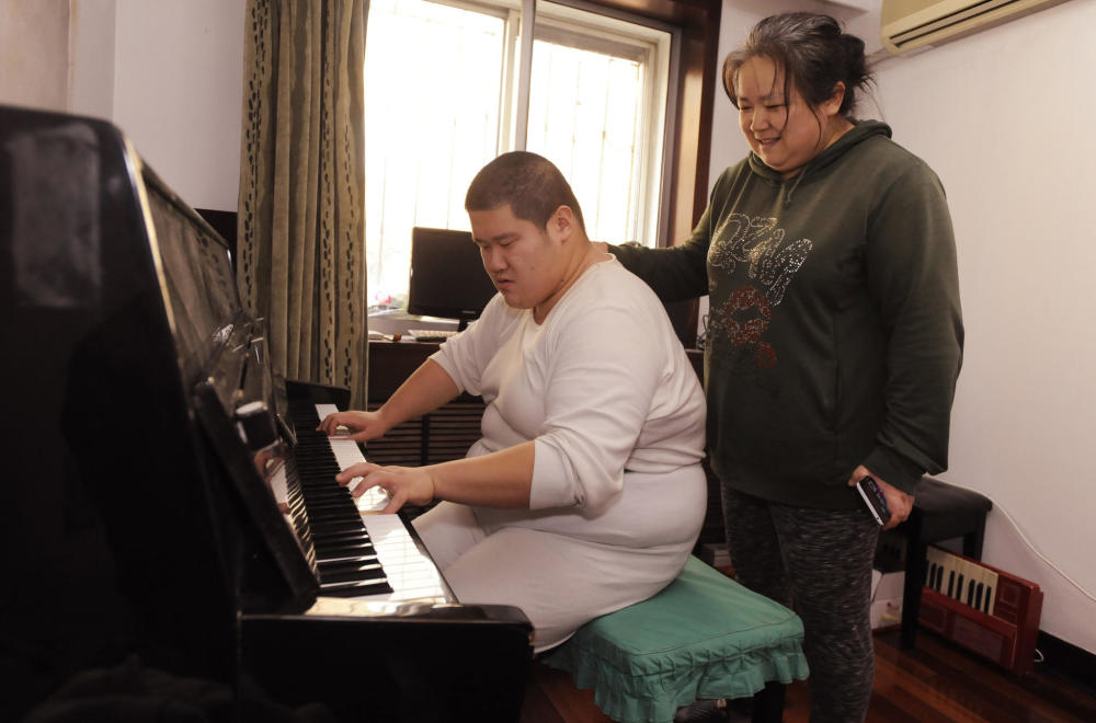 大儿子500多斤二儿子250多斤 单亲妈妈求助(组图)