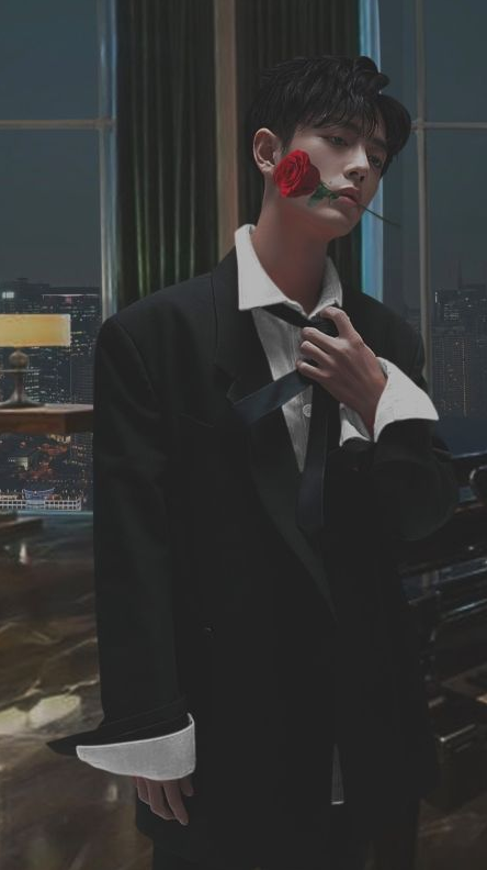 壁纸中的肖战嘴里叼着玫瑰,手上竟然在扯领带,有钱哥哥不要啊,你