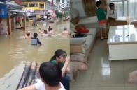 桂林遭遇特大暴雨引发洪水：游客街上乘竹筏 农户将猪赶到2楼客厅