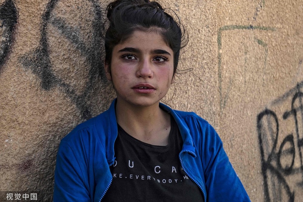 图为叙利亚避难的女孩.