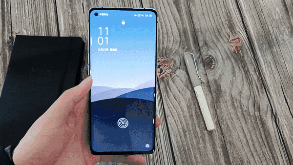 (动图:oppo reno3 pro屏幕指纹解锁)