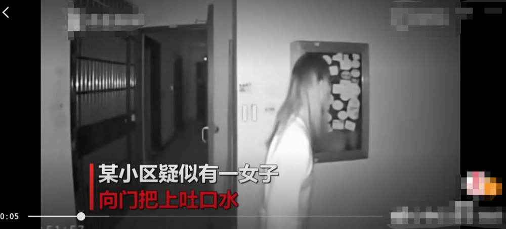 武汉一女子疑向门把手吐口水,目前小区新冠肺炎疫情严重,30多人被确诊
