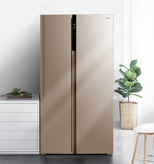 这款美的冰箱对开门冰箱机身涂色采用了米兰金色,隐藏式把手设计.