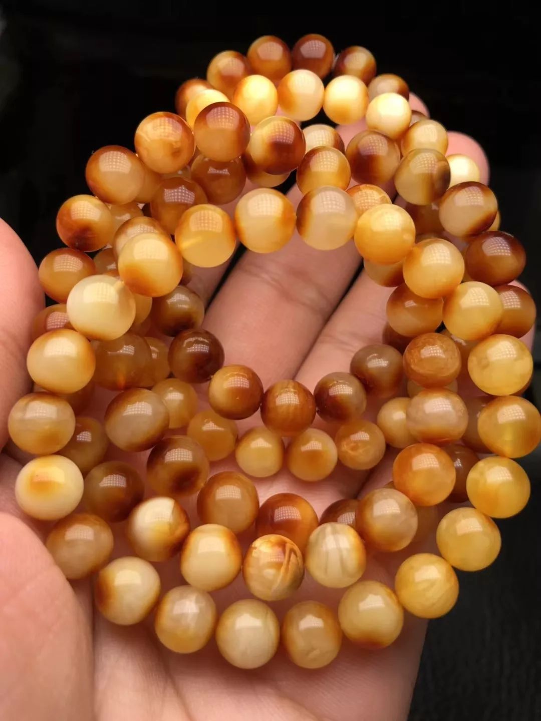 蜜蜡琥珀知多少——为什么有的蜜蜡要烤色?