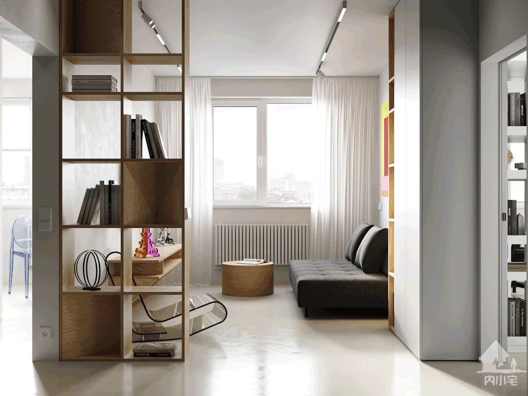 起居室与玄关的地面从黑色变成白色设计师用这种方法在视觉上划分了