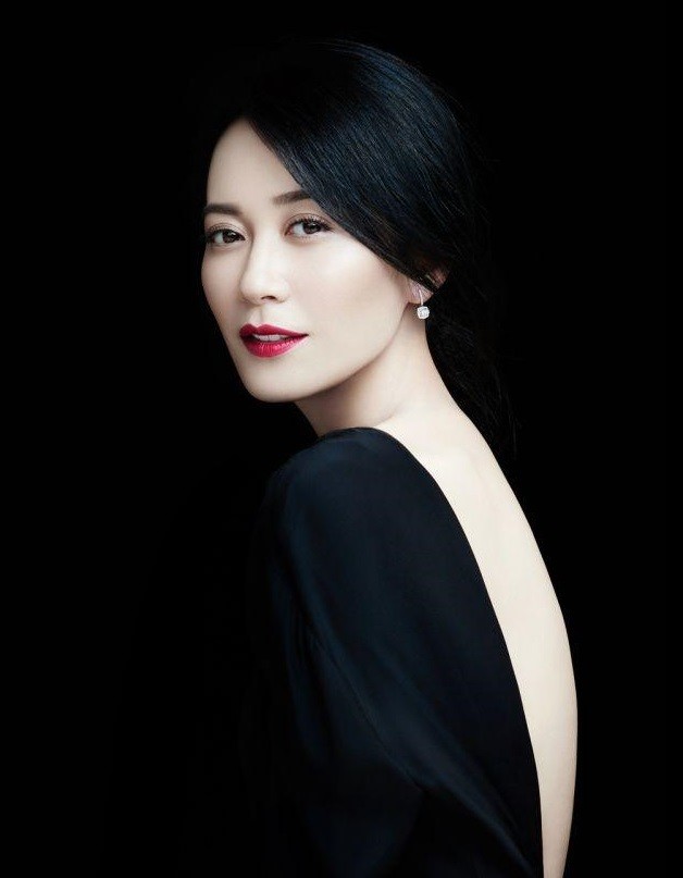 她是绯闻“绝缘体” 46岁仍美若当年(组图)