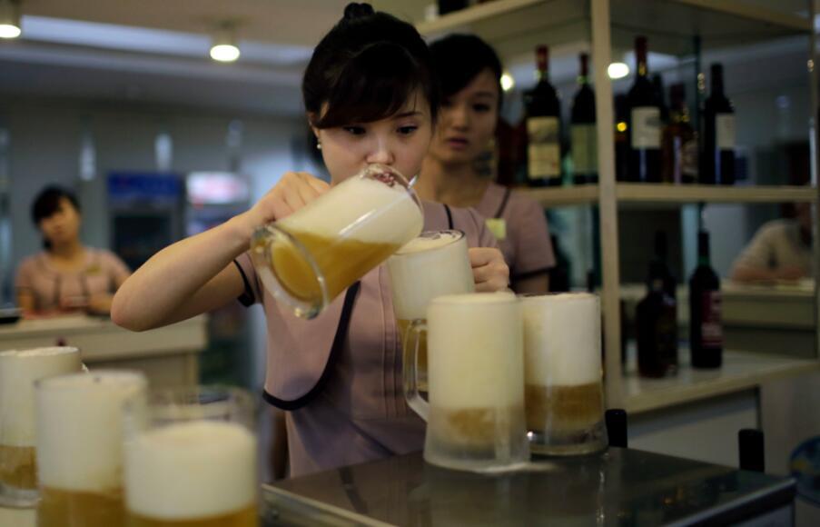 揭秘朝鲜餐厅女服务员：中文流利 能歌善舞 老外看呆（图） - 11