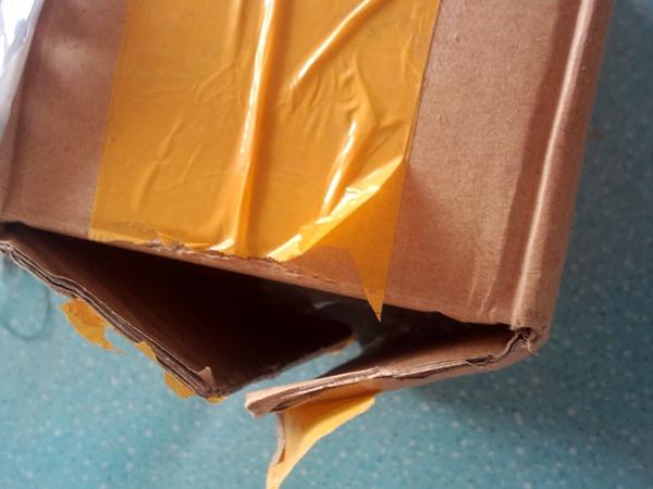 明明寄手机却收到8瓶牛奶 宅急送你出来解释一