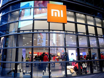 受回购优先股影响 小米2017年经营利润122亿