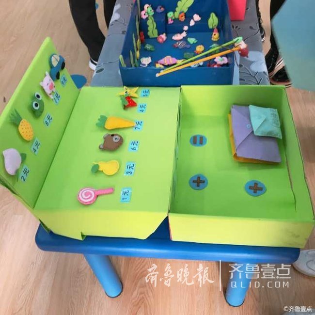 泰安一幼儿园老师自制益智玩具,玩着学知识