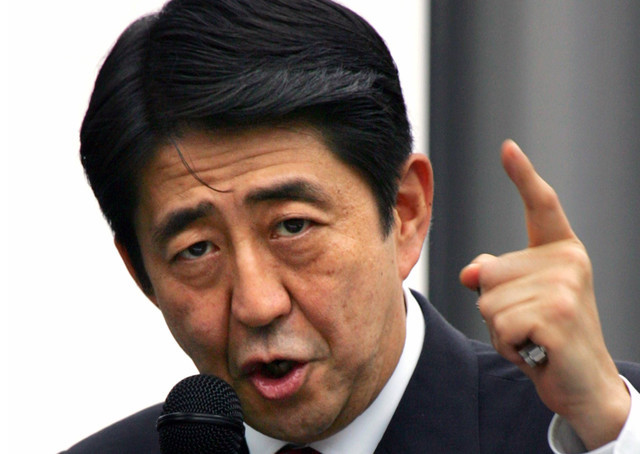 安倍称某国在南海填海造地 中方:想挑事?_军事