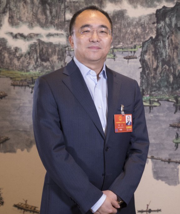 阎志老总_湖北首富阎志妻子图片