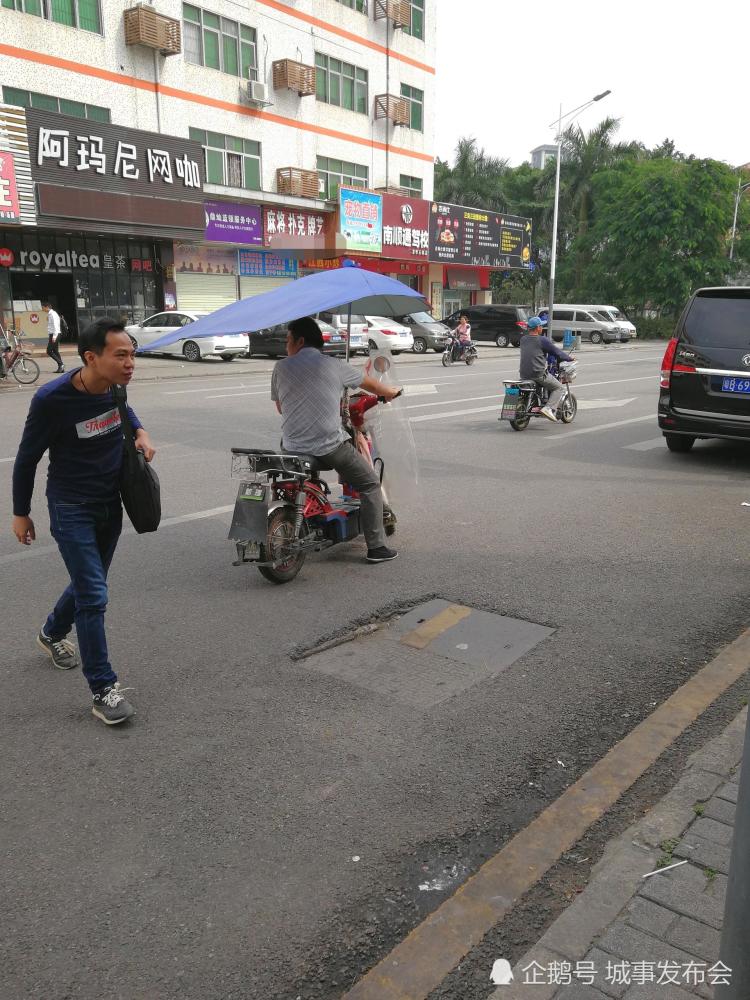 深圳龙华:整天守在汽车站门口的电动车拉客者,比乘车的旅客还多