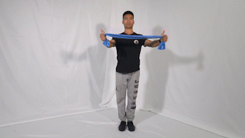 4.弹力带屈肘上举 方法和要领:1.站姿,躯干伸直稳定,脚固定弹力带.
