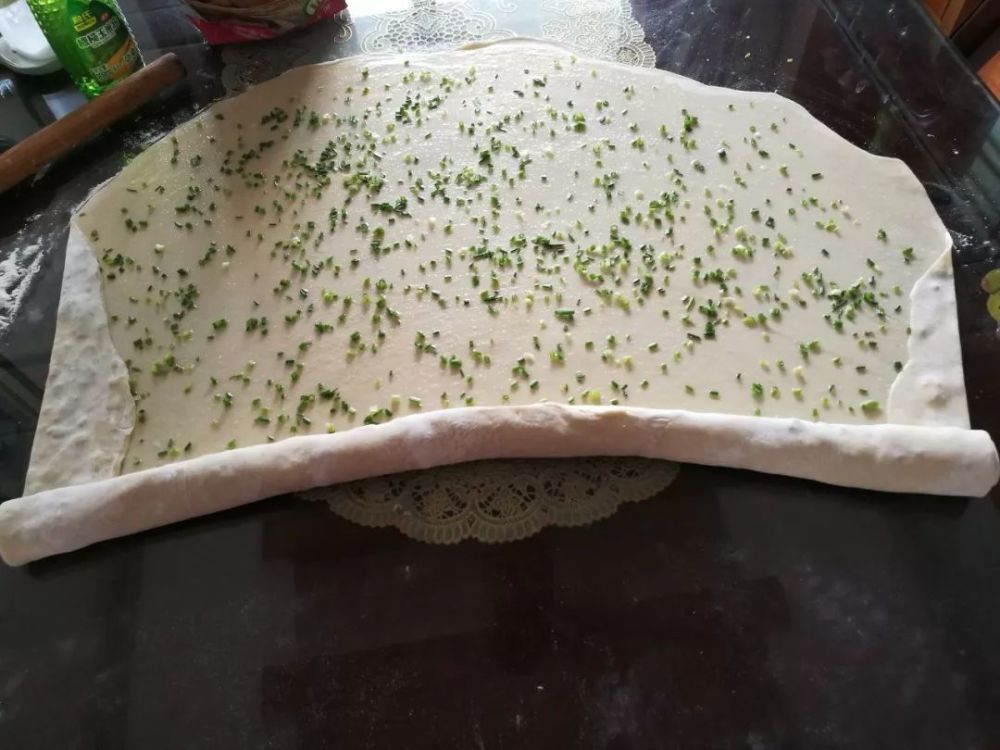 在丰县有一种让人荡气回肠的美食,它的名字叫——葱油饼