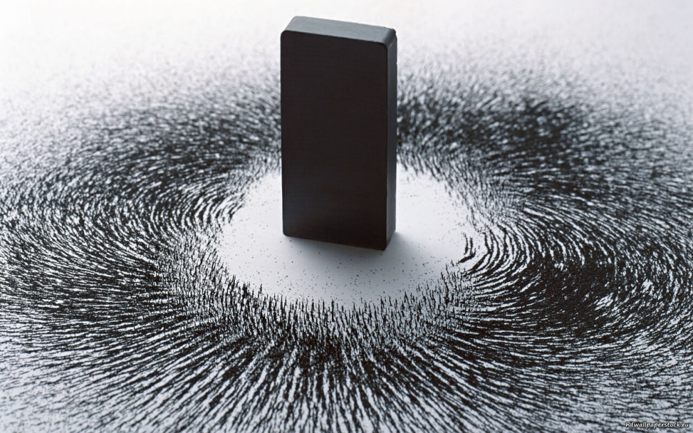 磁铁可以吸引铁,它是靠什么传递"吸力"的?