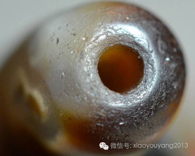 这种是被百千万年地热慢慢炖熟的,有些珠子由此还会产生冰裂纹