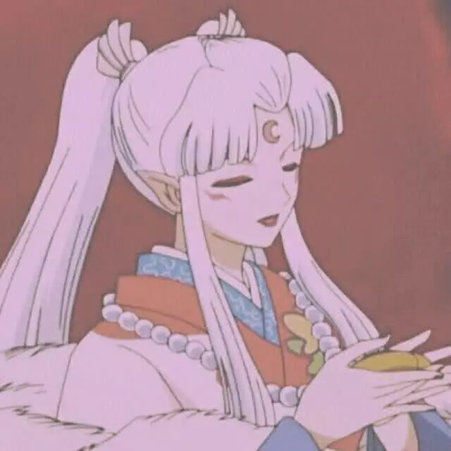 图片中是一个女生,她有着白色的长发,齐刘海造型,梳着一对双马尾,尖尖