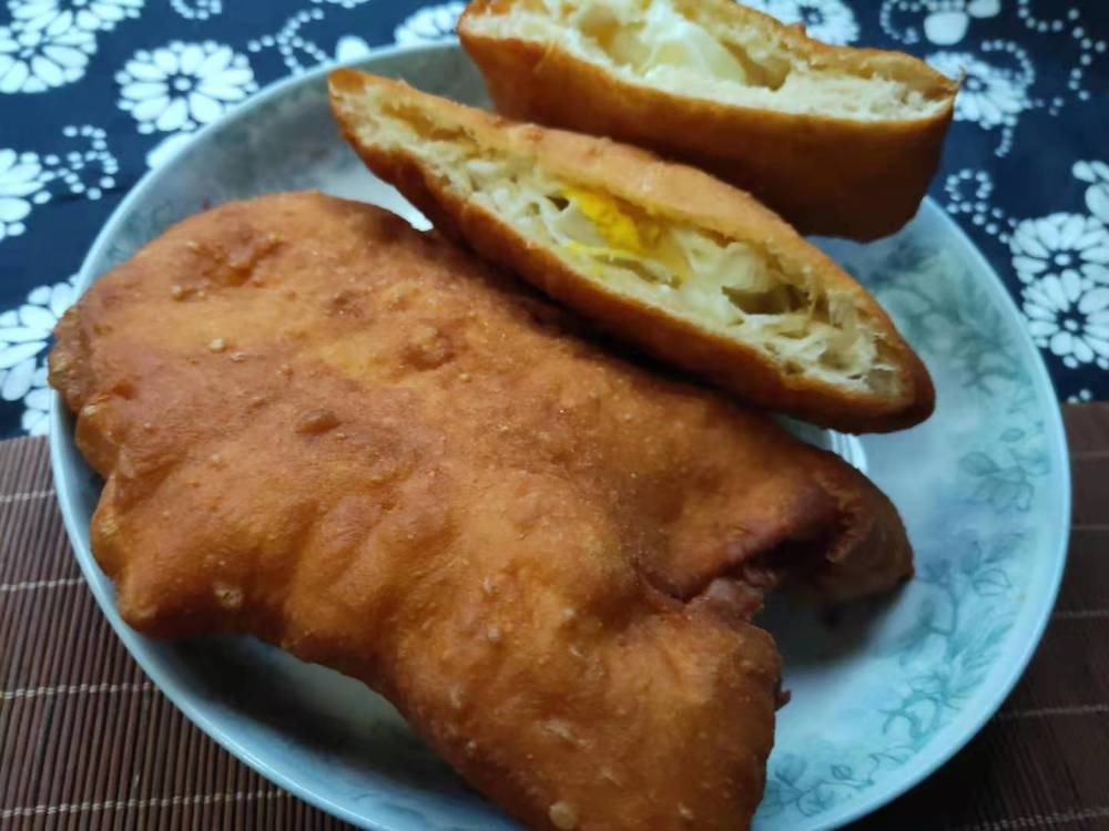 赵县传统小吃两款:肚里装着鸡蛋的"炸老虎"和焦脆的"炸盘算"