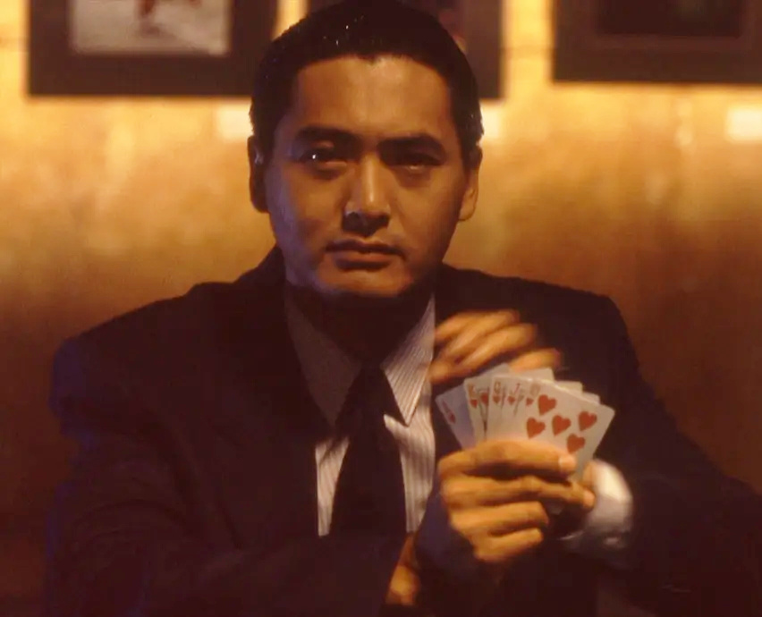 《赌神》两部曲是永远绕不开的经典佳作,赌神高进一出场自带王者风