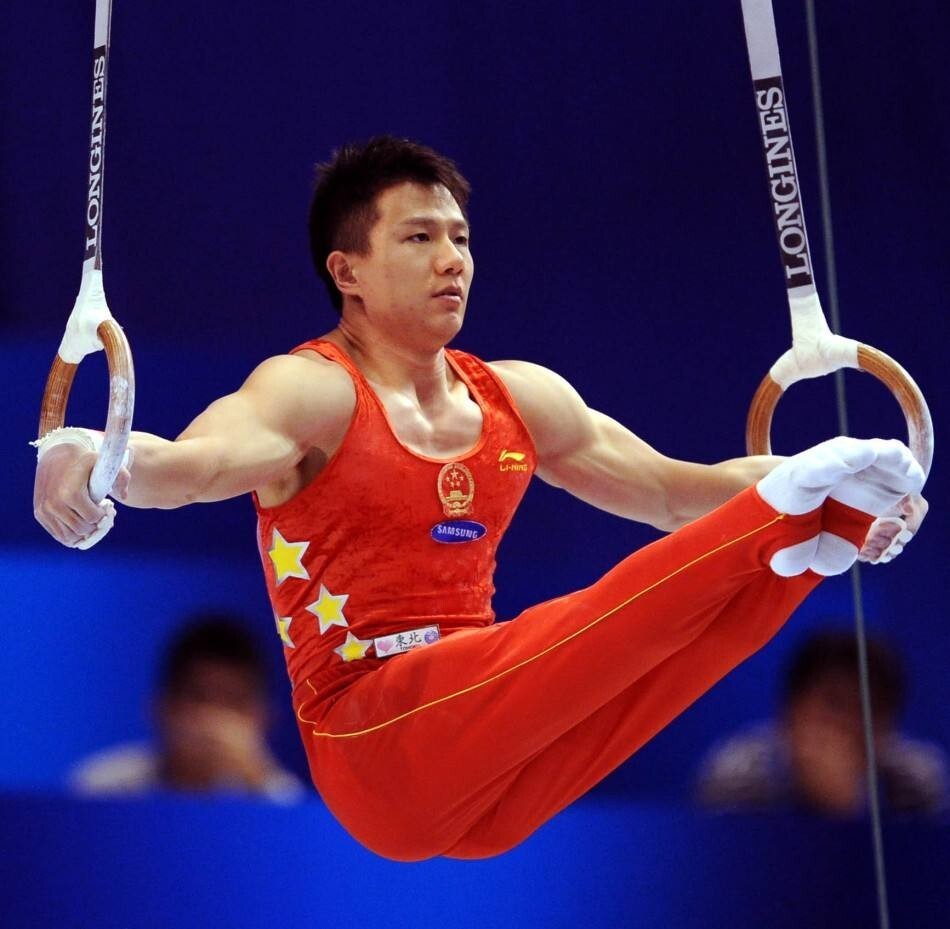 陈一冰:大器晚成的吊环王子,3夺奥运金牌,娇妻高他7cm,退役转型成功