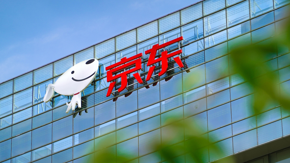 电商交易额老二位置或不保,京东紧盯拼多多_腾讯新闻