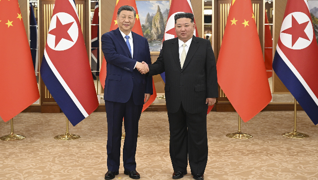 习近平同金正恩举行会谈