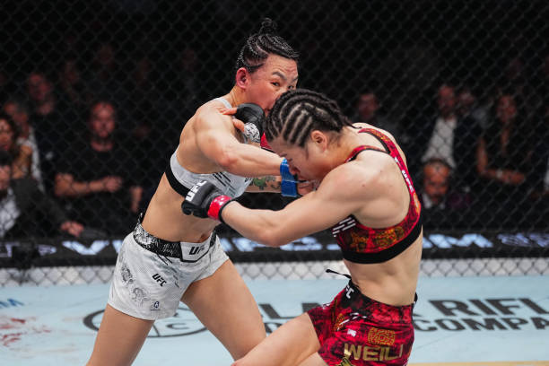 刚刚,张伟丽击败闫晓楠,卫冕金腰带!双方意志力令人!