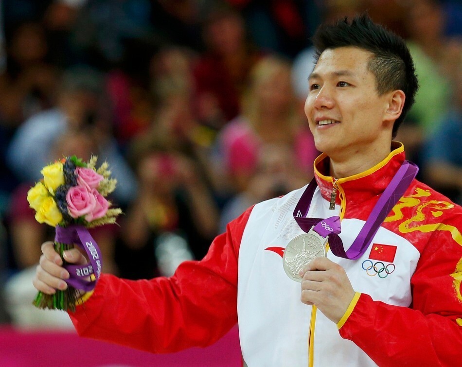 陈一冰:大器晚成的吊环王子,3夺奥运金牌,娇妻高他7cm,退役转型成功