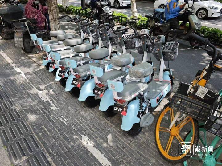 西湖边共享电瓶车渐热,这股风能刮回杭州核心城区吗