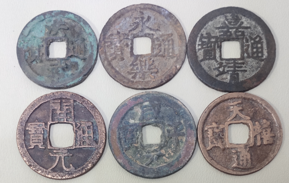 在古代，前朝钱、叛逆钱、外国钱为什么也能照常流通？| 借“钱”说事41_腾讯新闻