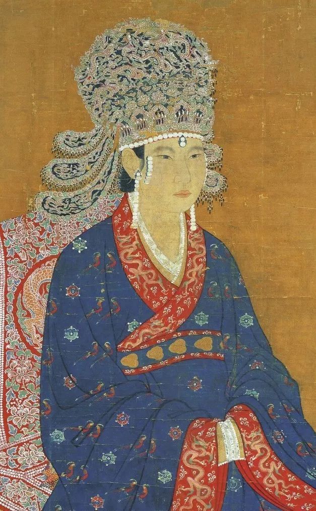 赵光远《咏手》之二中如此描绘:"炉面试香添麝炷,舌头轻点贴金钿.