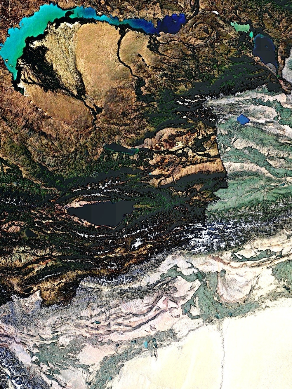 塔里木盆地北面是天山,西面是帕米尔高原,南面是昆仑山.