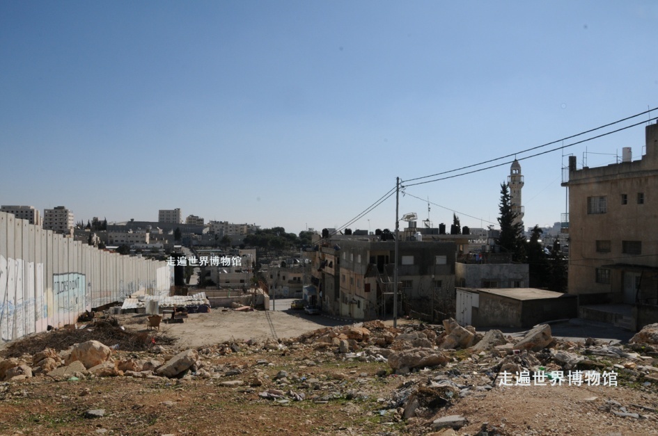 一个中国人在巴以隔离墙上写下这几个字_腾讯新闻