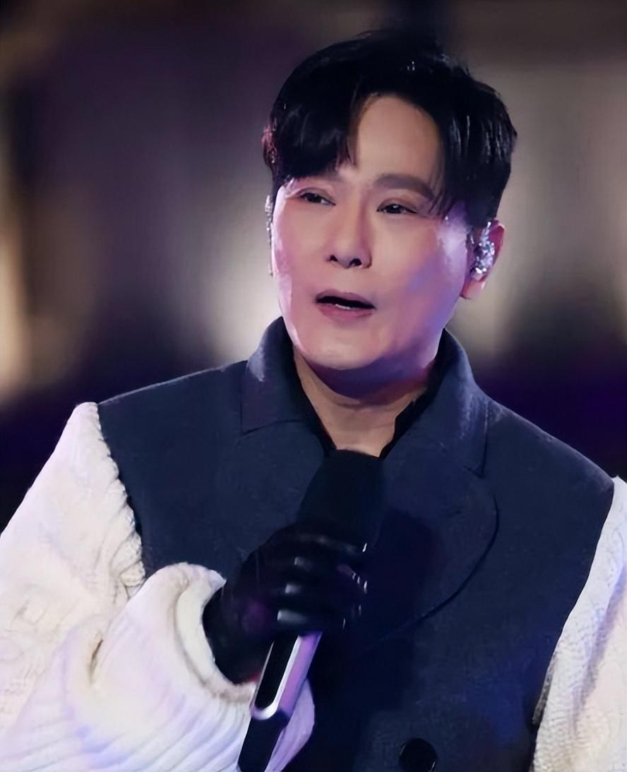34年后再看张信哲:从"情歌王子"到过气歌手,他经历了什么?_腾讯新闻