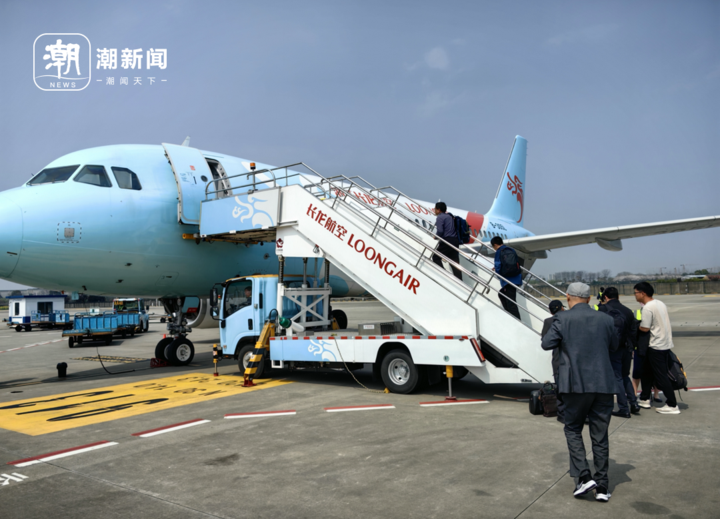 "长龙"腾空开天路 千里浙青一日还——浙江三代援青人与"杭州—德令哈