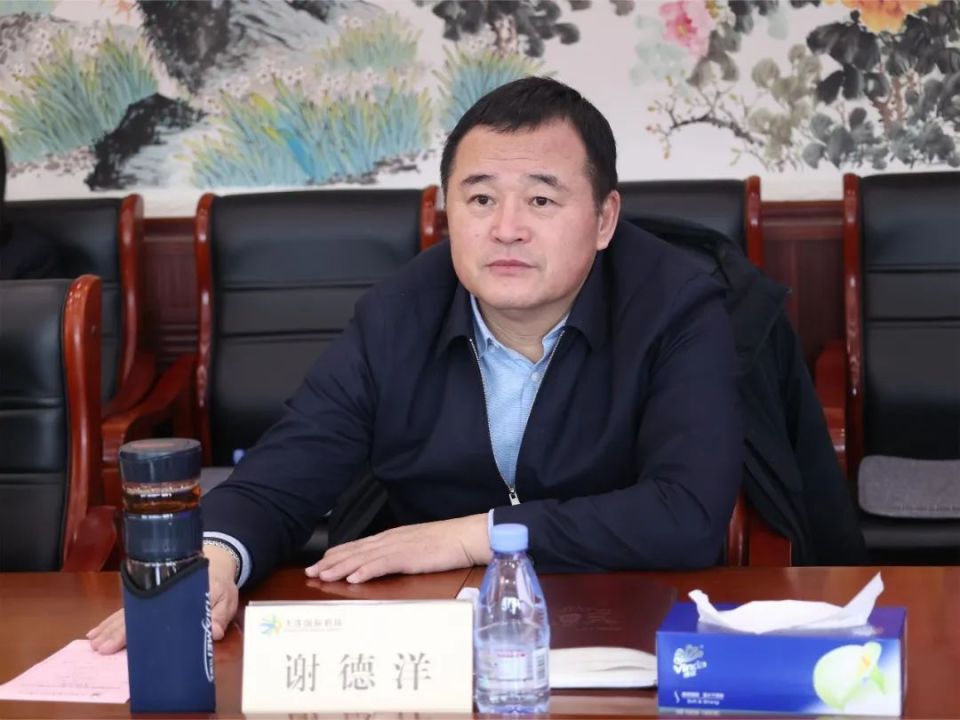 中建四局党委书记,董事长易文权拜会大连国际机场集团有限公司