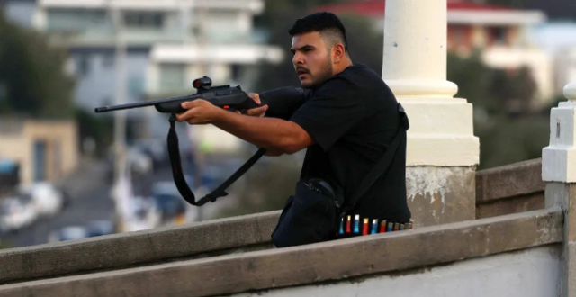 澳大利亚海滩枪击事件嫌疑人受到59项指控缩略图