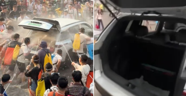 虚惊一场！车主回应泼水节被强拉车门喷水致“冒白烟”：是水雾 车没问题缩略图