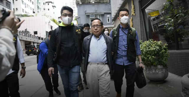 港媒关注乱港分子何俊仁涉嫌妨碍司法公正被拘捕，现场照片曝光_腾讯新闻
