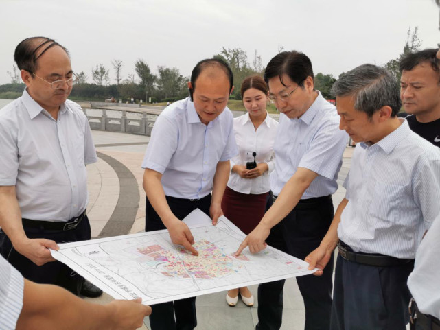 银行与吴祖明常务副市长,商丘市发展投资集团有限公司董事长薛天江