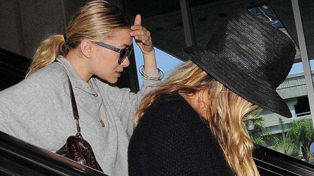 好莱坞故事:伊丽莎白·奥尔森的美少女成长记