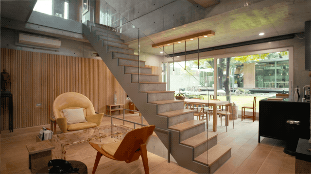 从设计到建成花了6年,做了20几版稿子,最后才设计出这样三角形的房子.